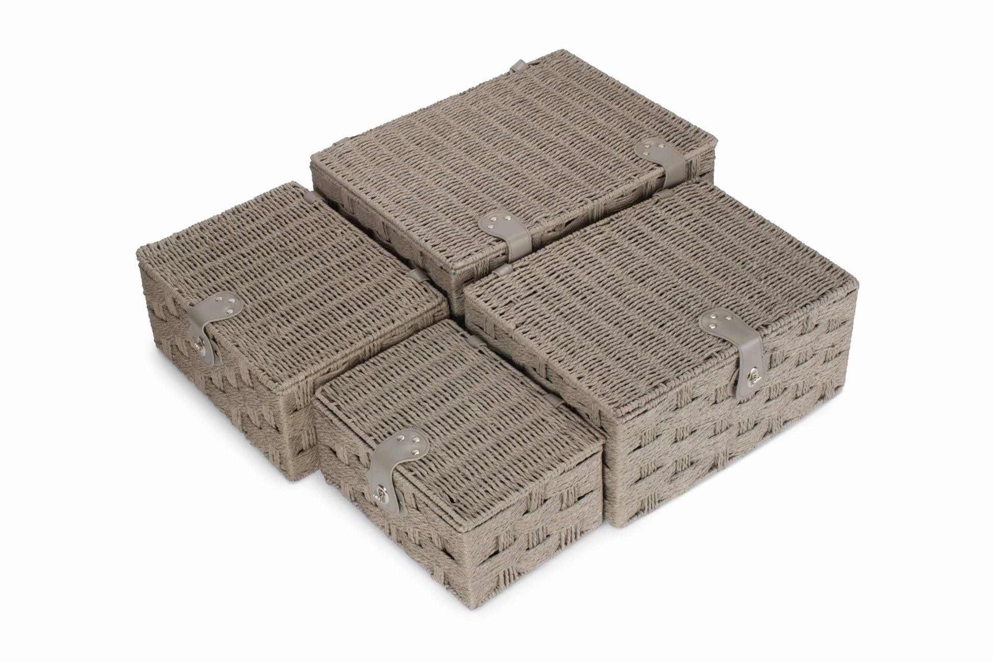 Four grey paper rope hampers stacked on a white background