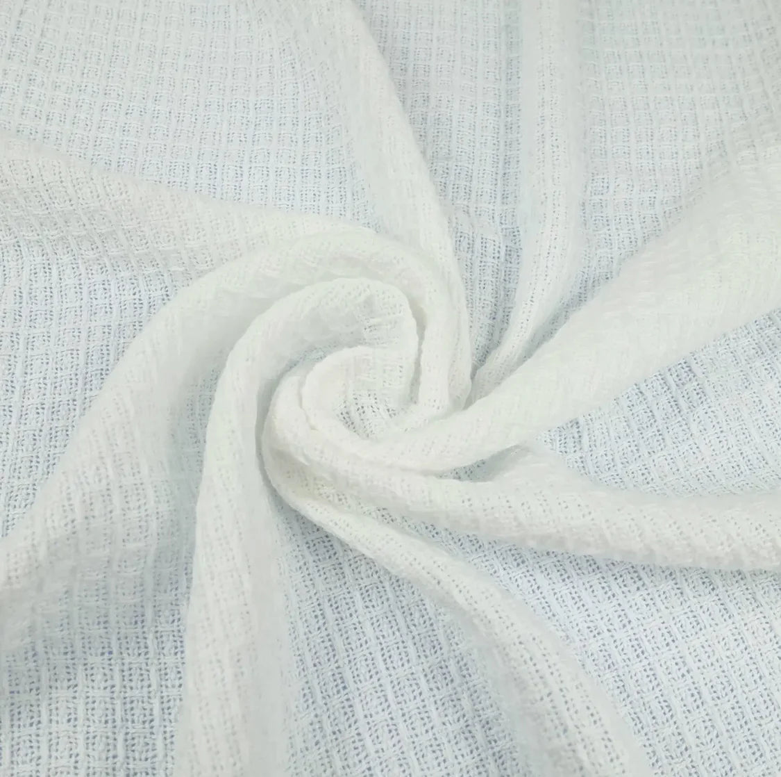 white cotton baby receiving blanket