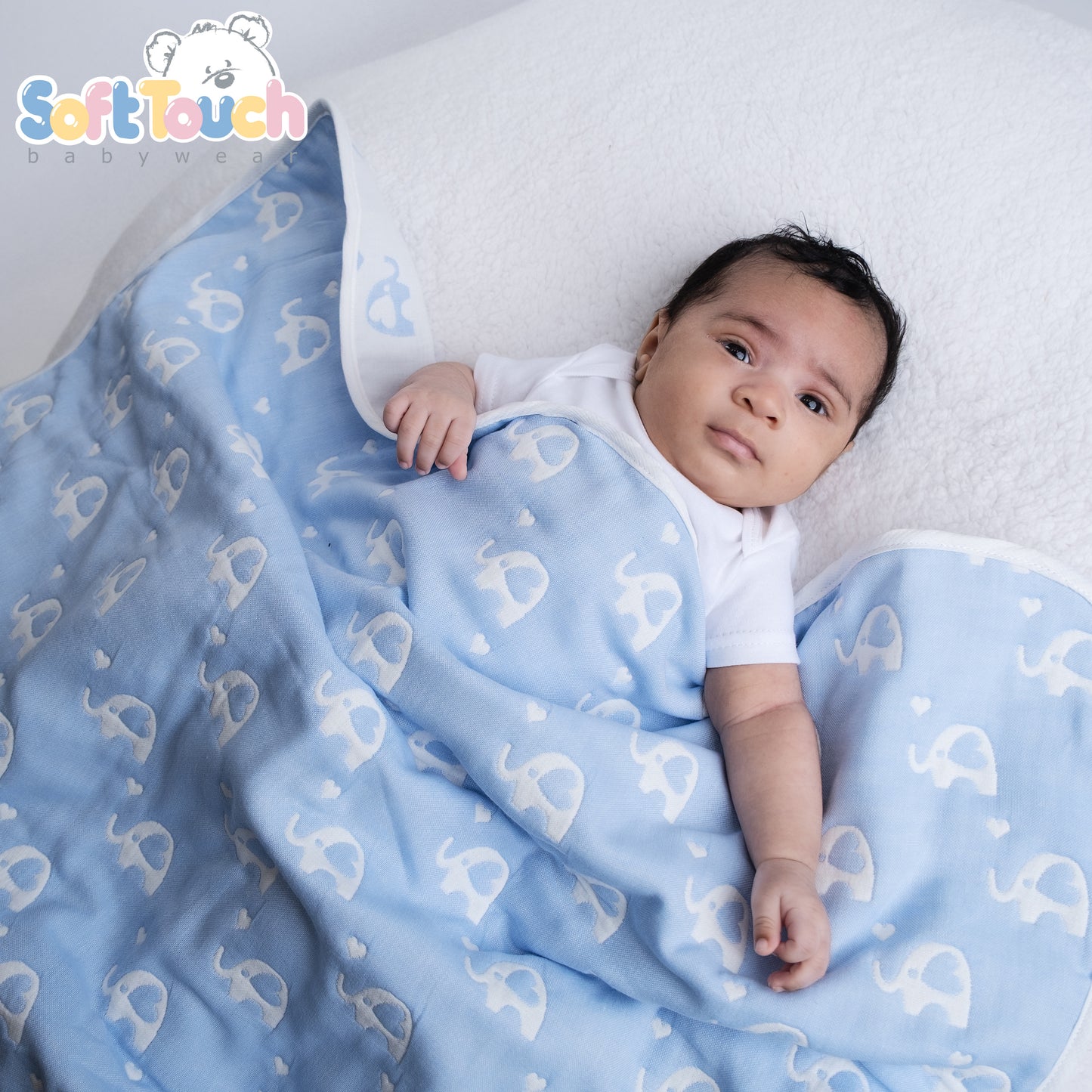 100% cotton blue baby wrap with a white elephant print.