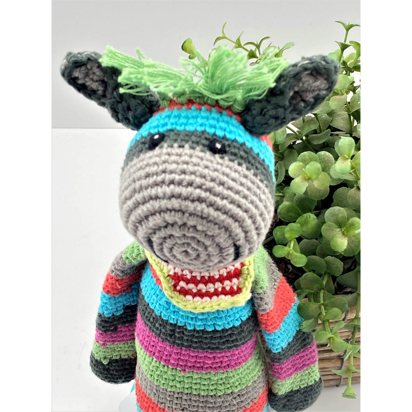 Knitted donkey baby rattle