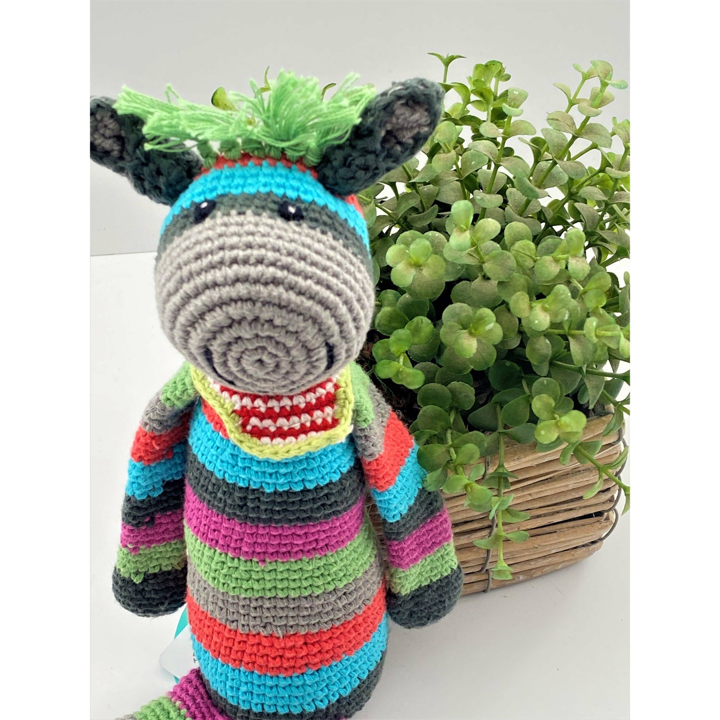 Knitted donkey baby rattle