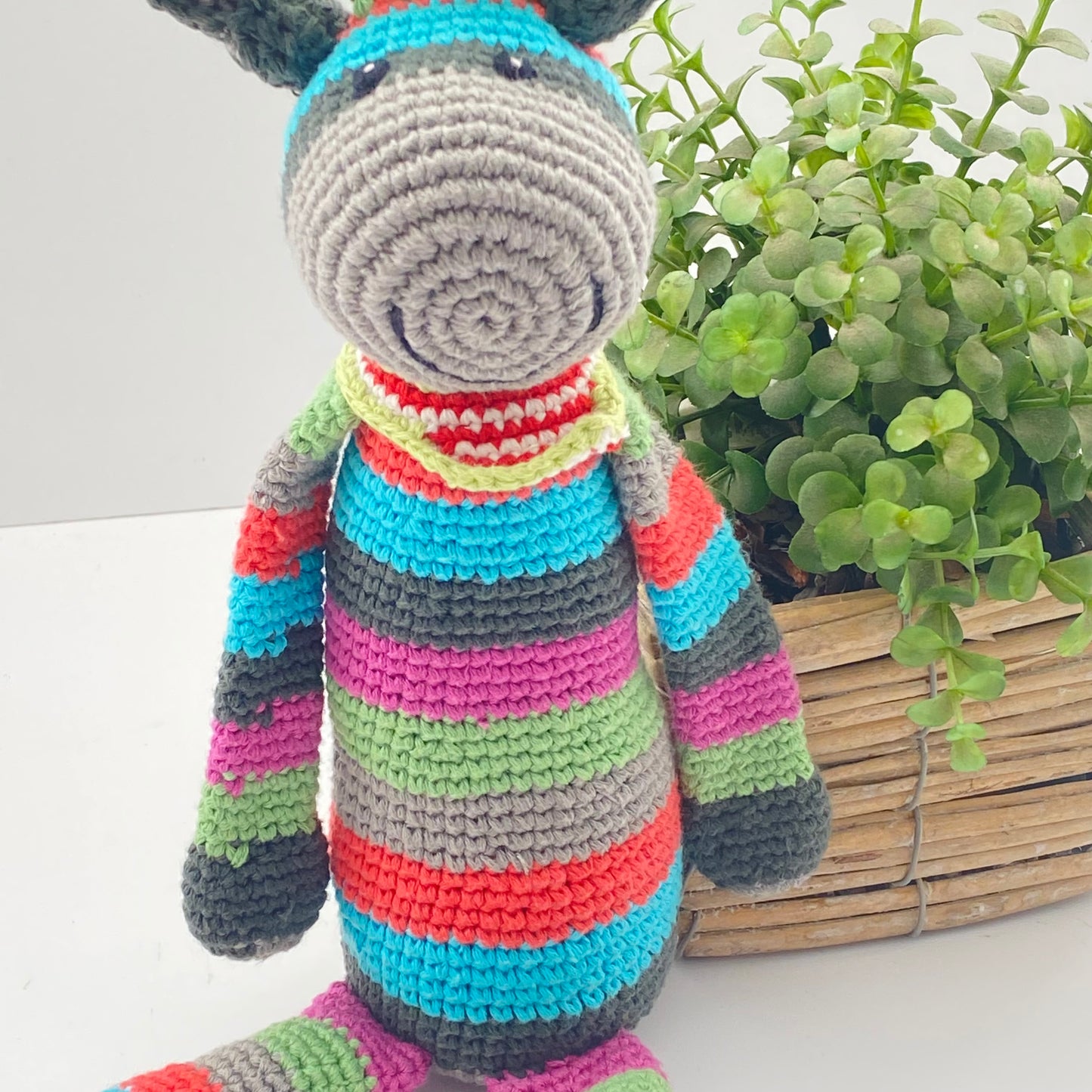 Knitted donkey baby rattle