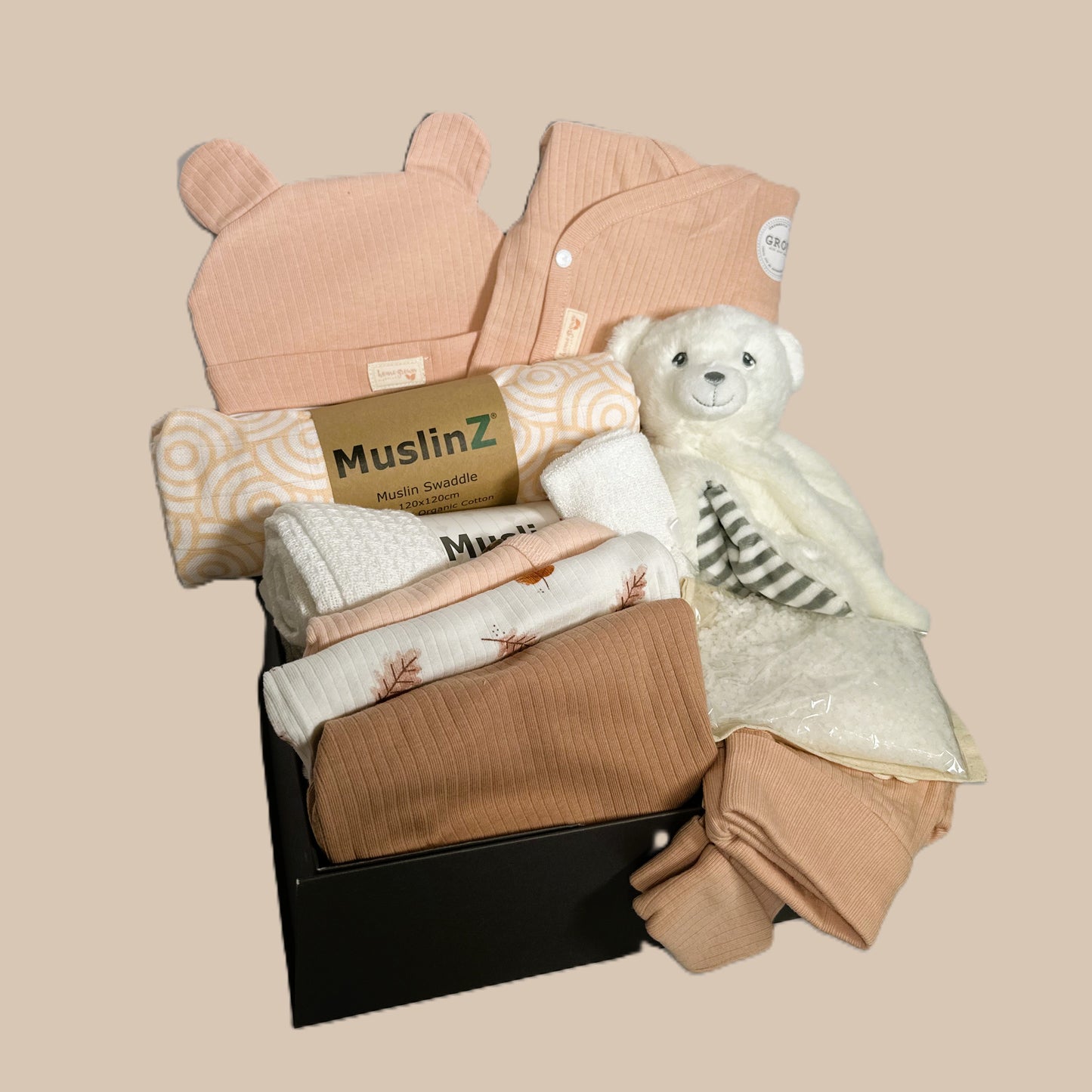 Want a perfect new baby girl hamper? We have it here for you. Not pink, not fussy, just right. Celebrate the arrival of the special new baby with our