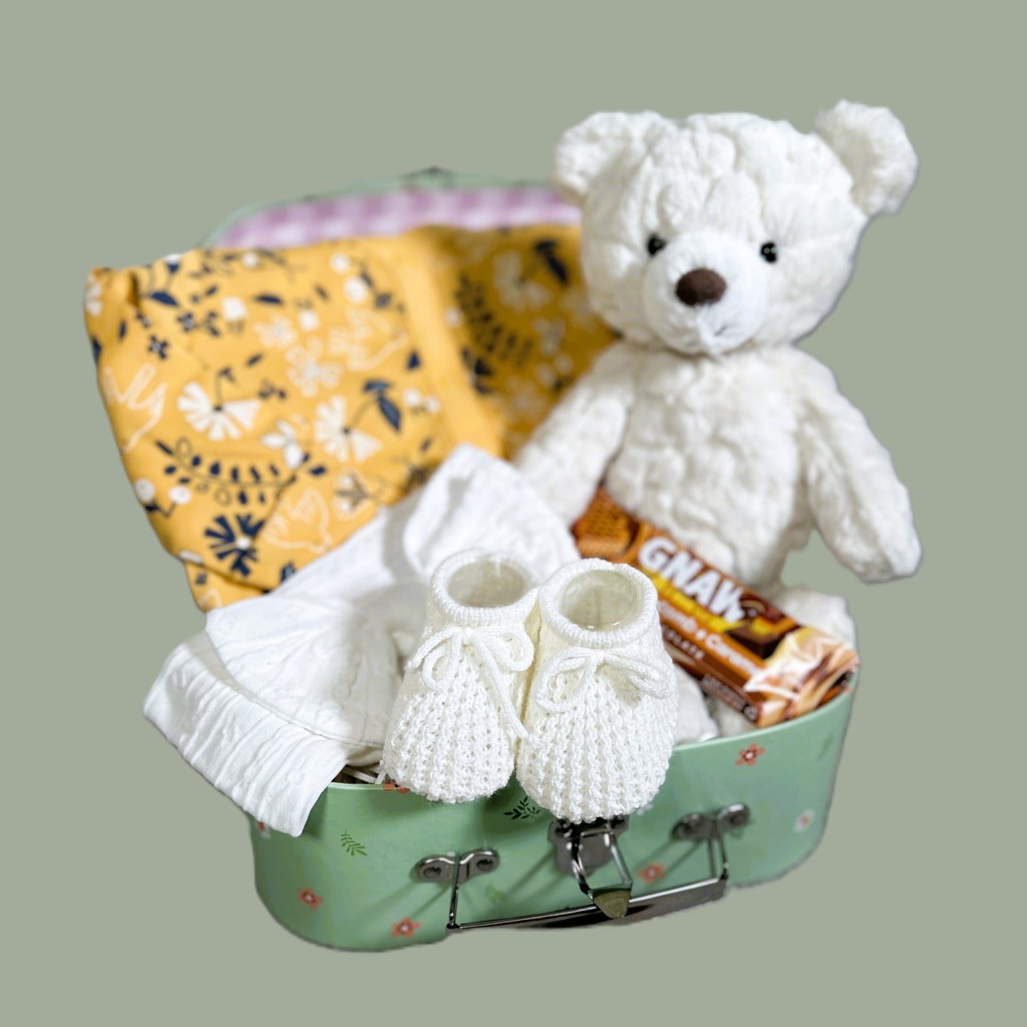 baby girl hamper with bear and baby clothing