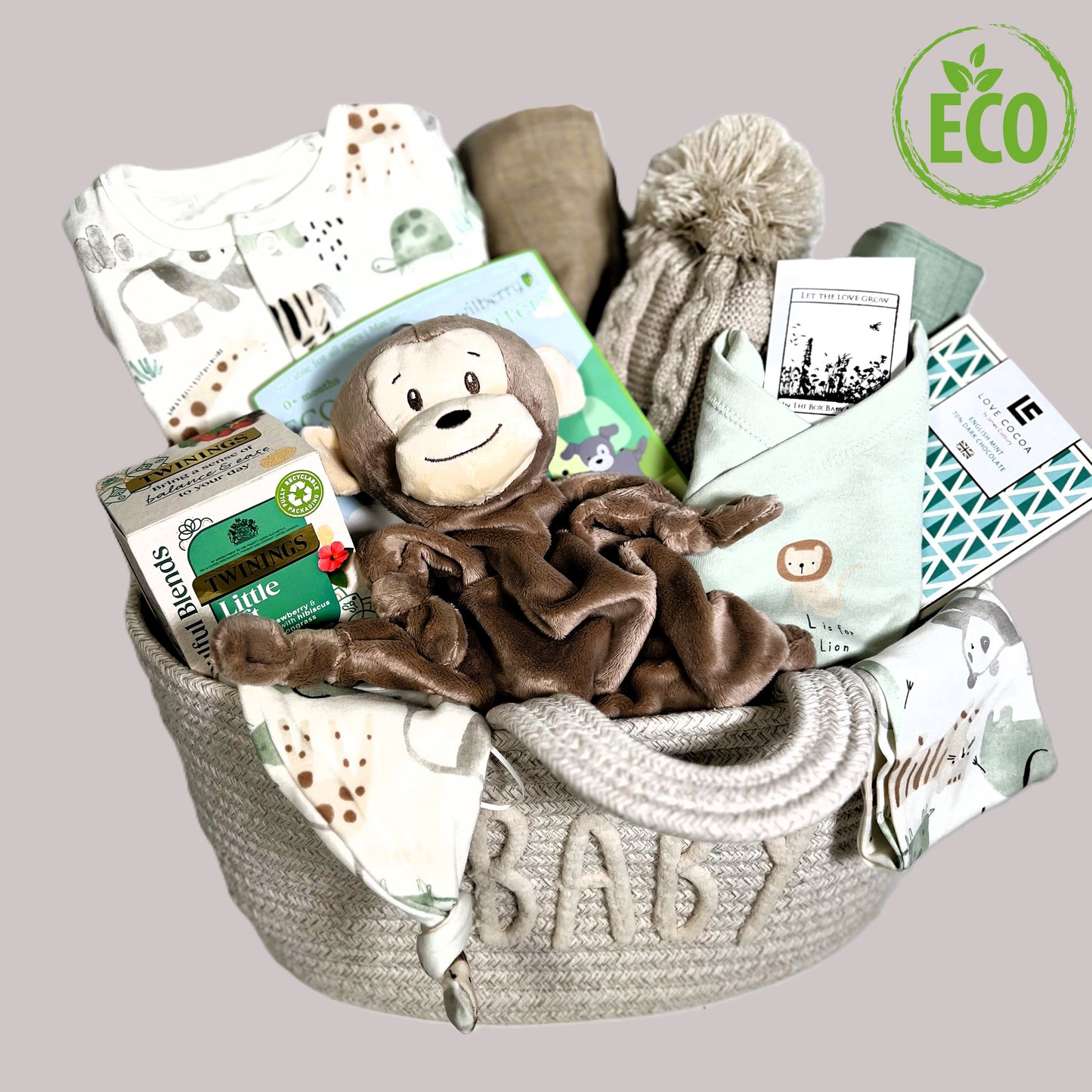 Baby shower gifts - monkey themed with a cotton layette set, a monket baby comfoter and a cotton rope nappy changing basket.