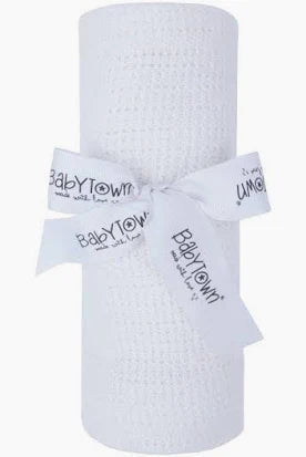 White cellular baby blanket with 'BabyTown' branding on a white background