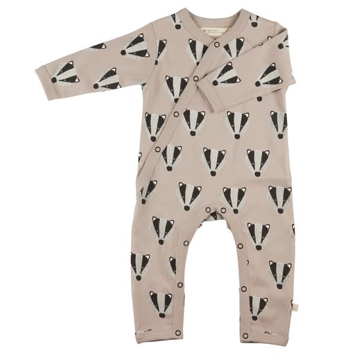 GOTS certified organic cotton baby romper in a stone colour with a black and grey badger face print. The romper has fold over cuffs.