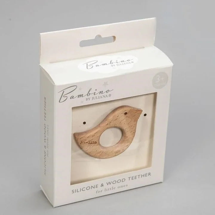 Wooden teether in a 'Bambino' branded box on a gray background