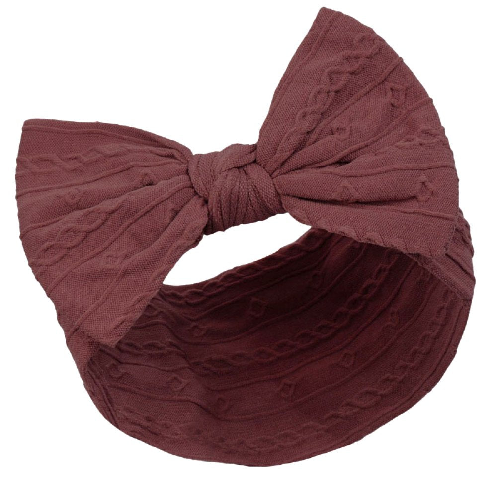 Maroon textured bow baby headband on a white background