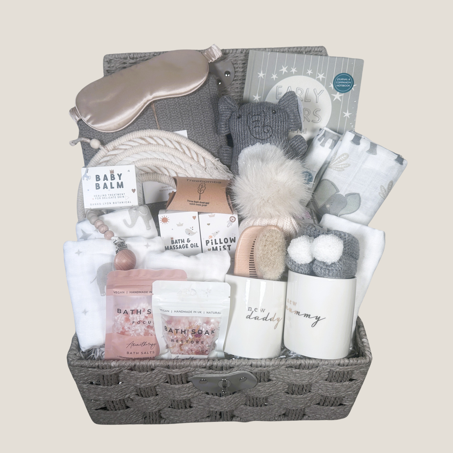 A new baby neutral baby hamper with an elephant theme, new mummy and daddy mugs and baby toiletries