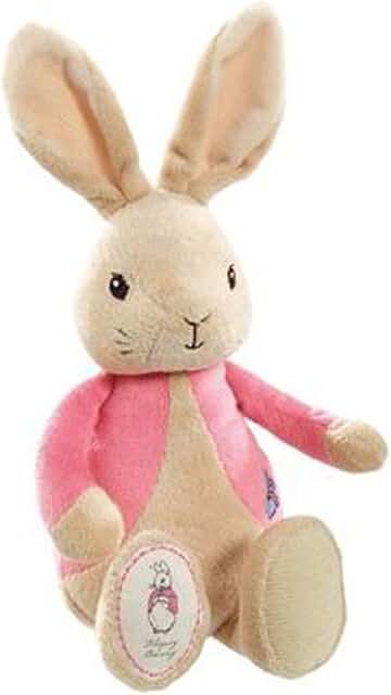 Plush  Flopsey rabbit rattle toy with pink body and beige ears on a white background