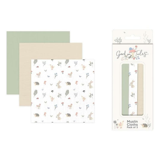 Set of three muslin cloths with nature-themed patterns and packaging on a white background