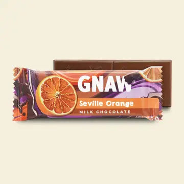 GNAW Seville Orange milk chocolate bar packaging on a beige background
