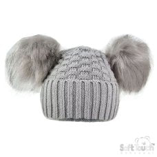 Baby knitted hat with two large pom-poms on a white background