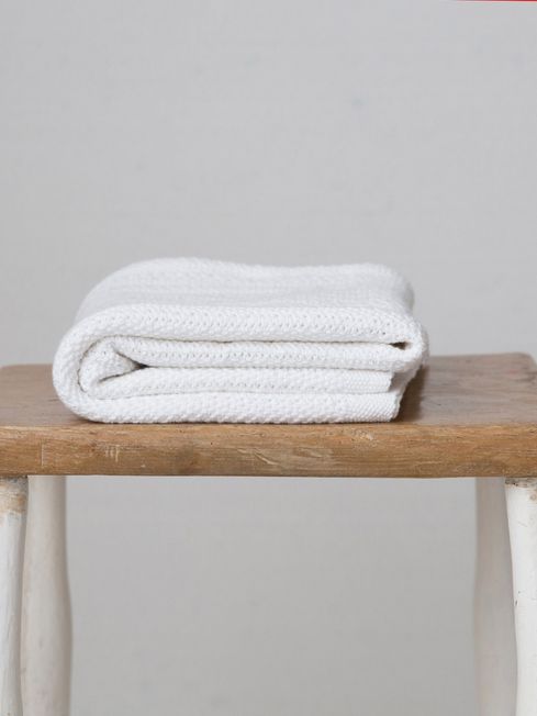 white cotton cellular baby blanket