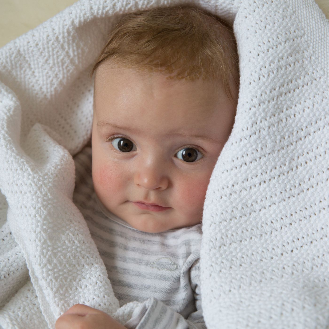 White cotton cellular baby blanket