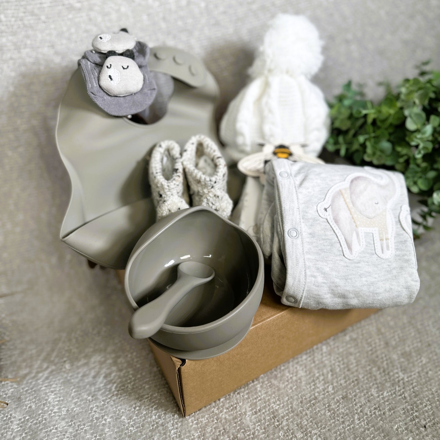 Unisex baby hamper with weaning bowl, bib and spoon and baby booties