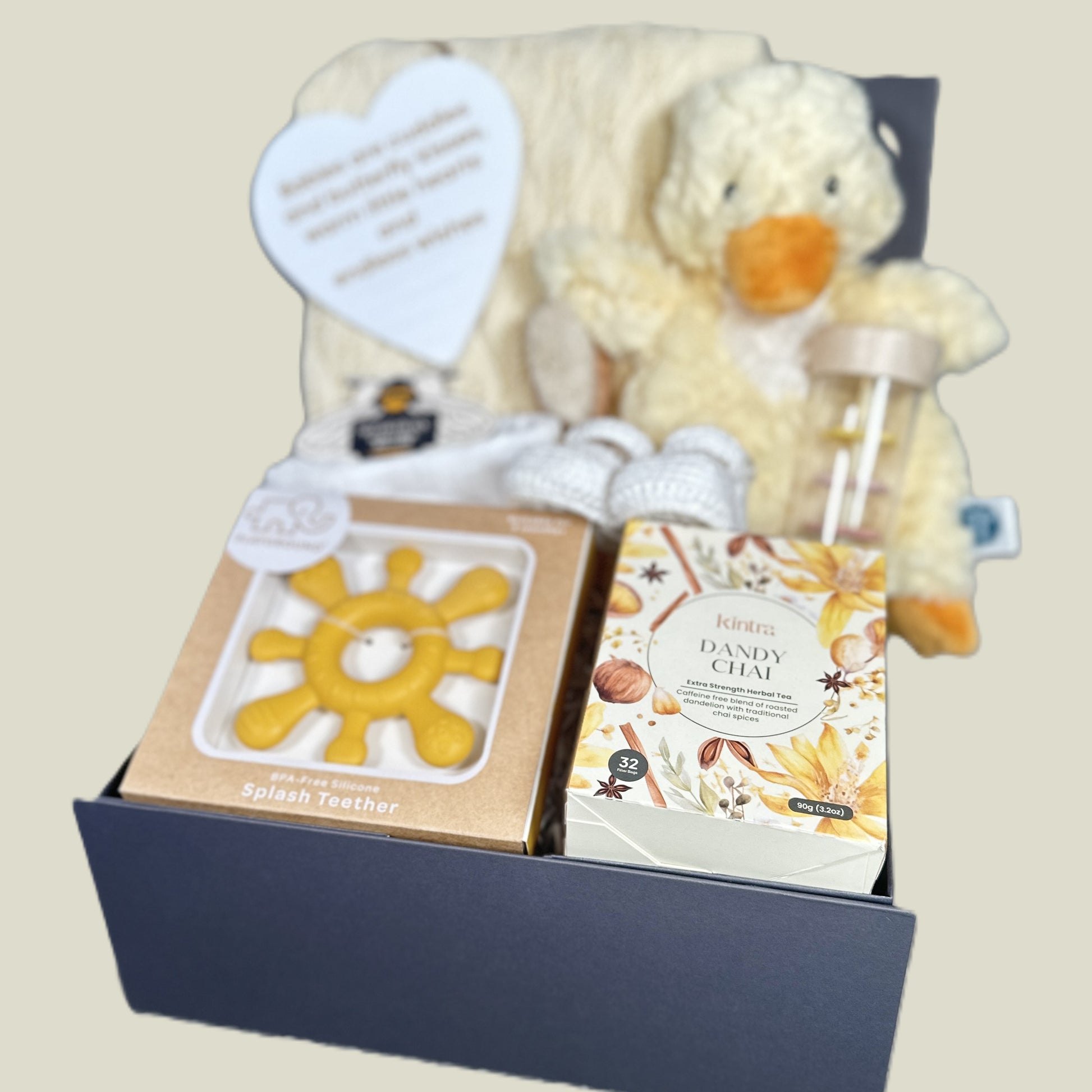Yellow unisex new baby hamper for maternity leave, yellow duck lovey and yellow baby blanket included.