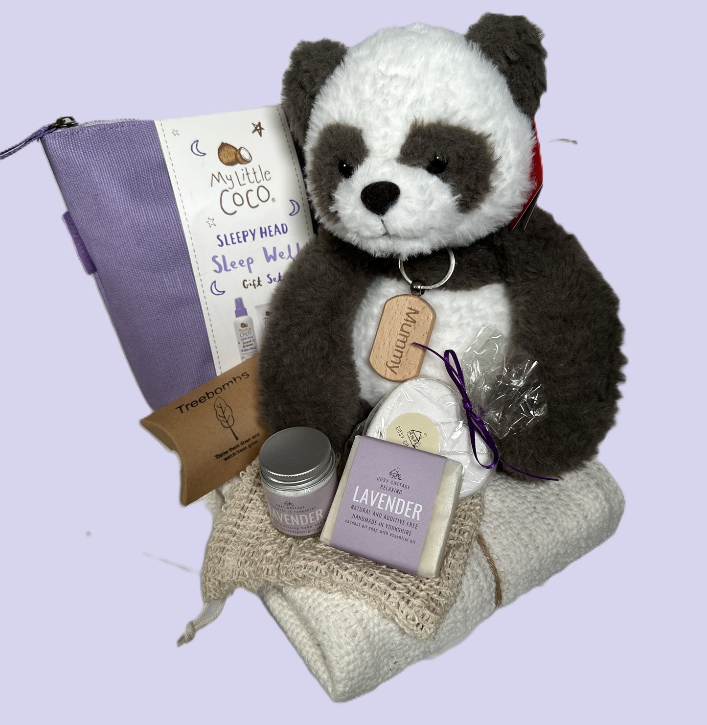 Panda baby hamper with panda soft baby toy, white cotton cellular baby blanket, new mummy natural toiletries and baby toiletries. New Mummy keyring.