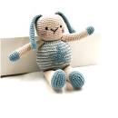 A hand crocheted bunny baby toy made in rural bangladesh giving employent to local women to save them form having to leaving their children to work in the cities.