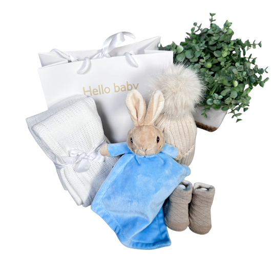 Peter Rabbit baby hamper gist with comforter, baby blanket, baby sock, pompom baby hat and "Hello baby " gift bag