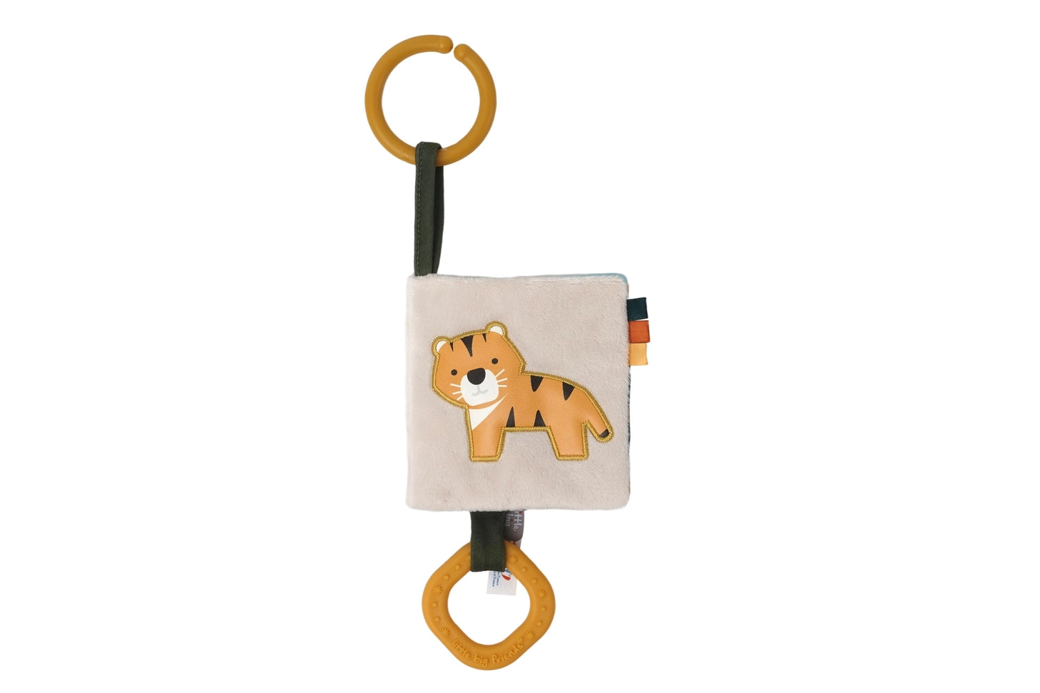 Baby activity soft cloth book with a tiger design  and silicone teether on a beige background