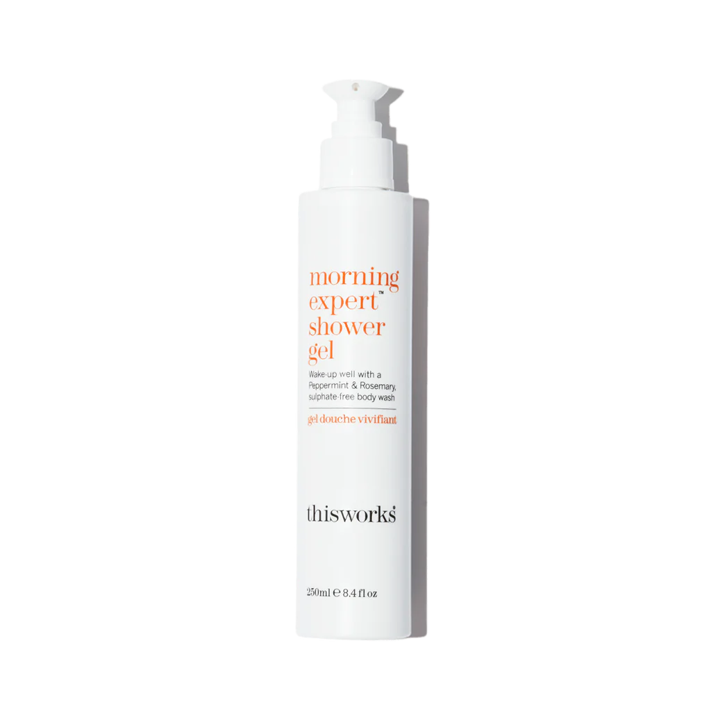 Bottle of 'Thisworks' morning expert shower gel on a white background