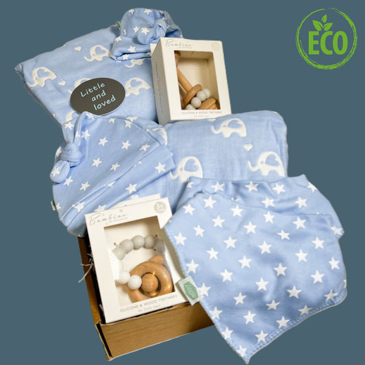 A blue new baby boy twins gift contining 2 x blue and whit elphant print baby blankets, 2 blue with white stars ababy knotty hats, 2 x blue with white stars cotton dribble bibs ans 2 Bambino Montessori baby teething toys