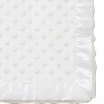 White baby blanket with ribbon edging.