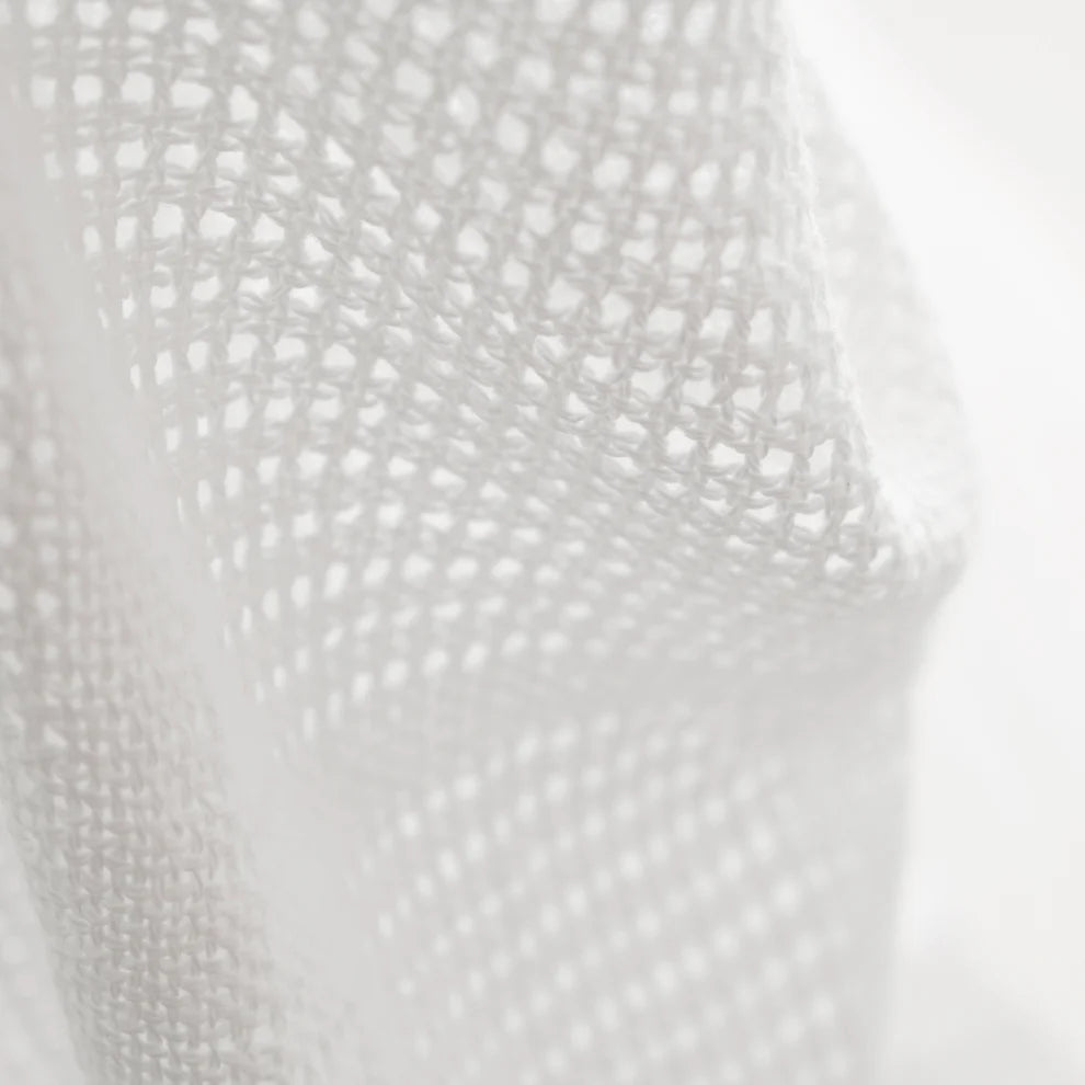 white cellular baby blanket
