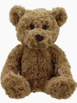 A soft toy teddy bear made from recycled plastic with an embroidered face.