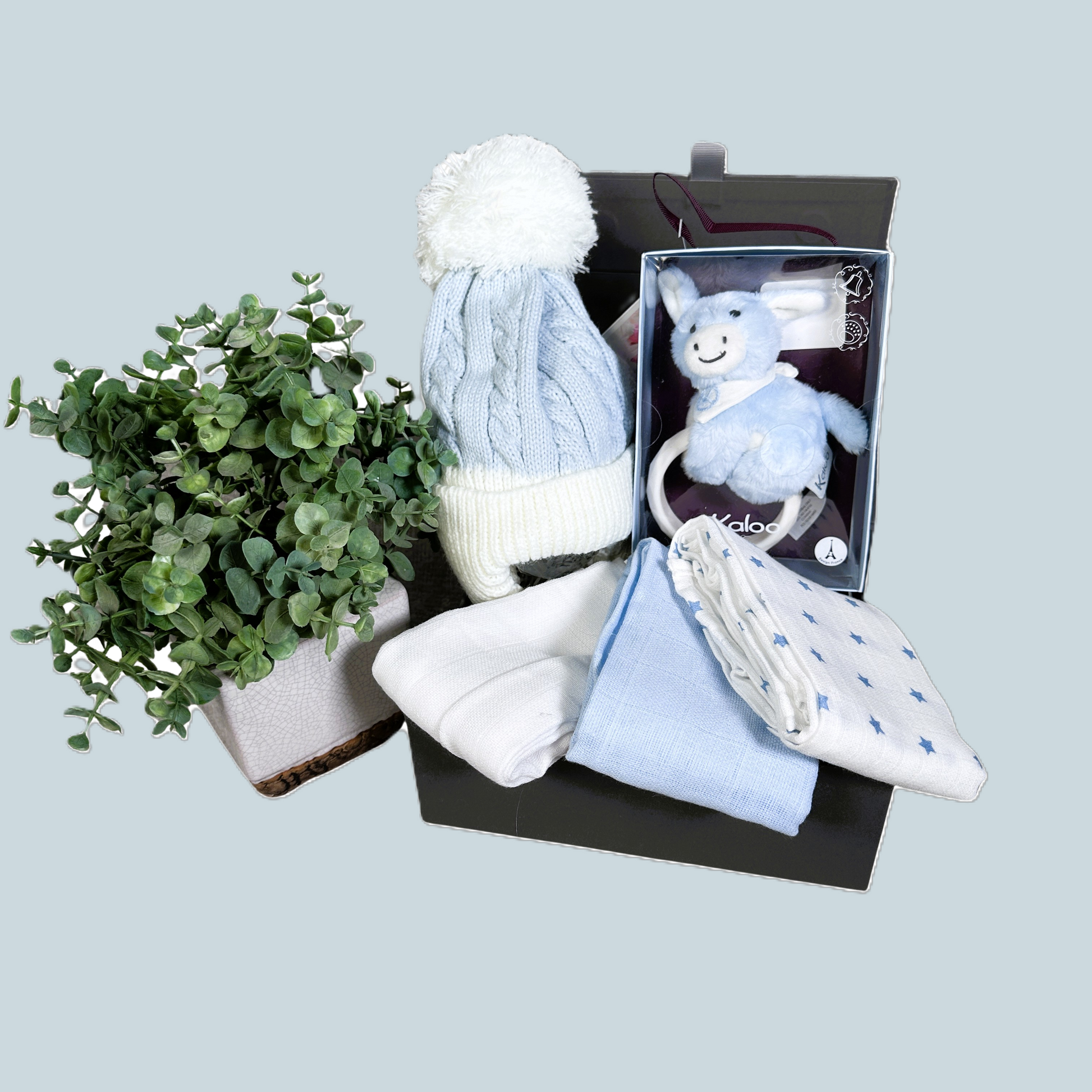blue baby hamper gift with baby pompom hat ,blue and white muslins a donkey baby rattle