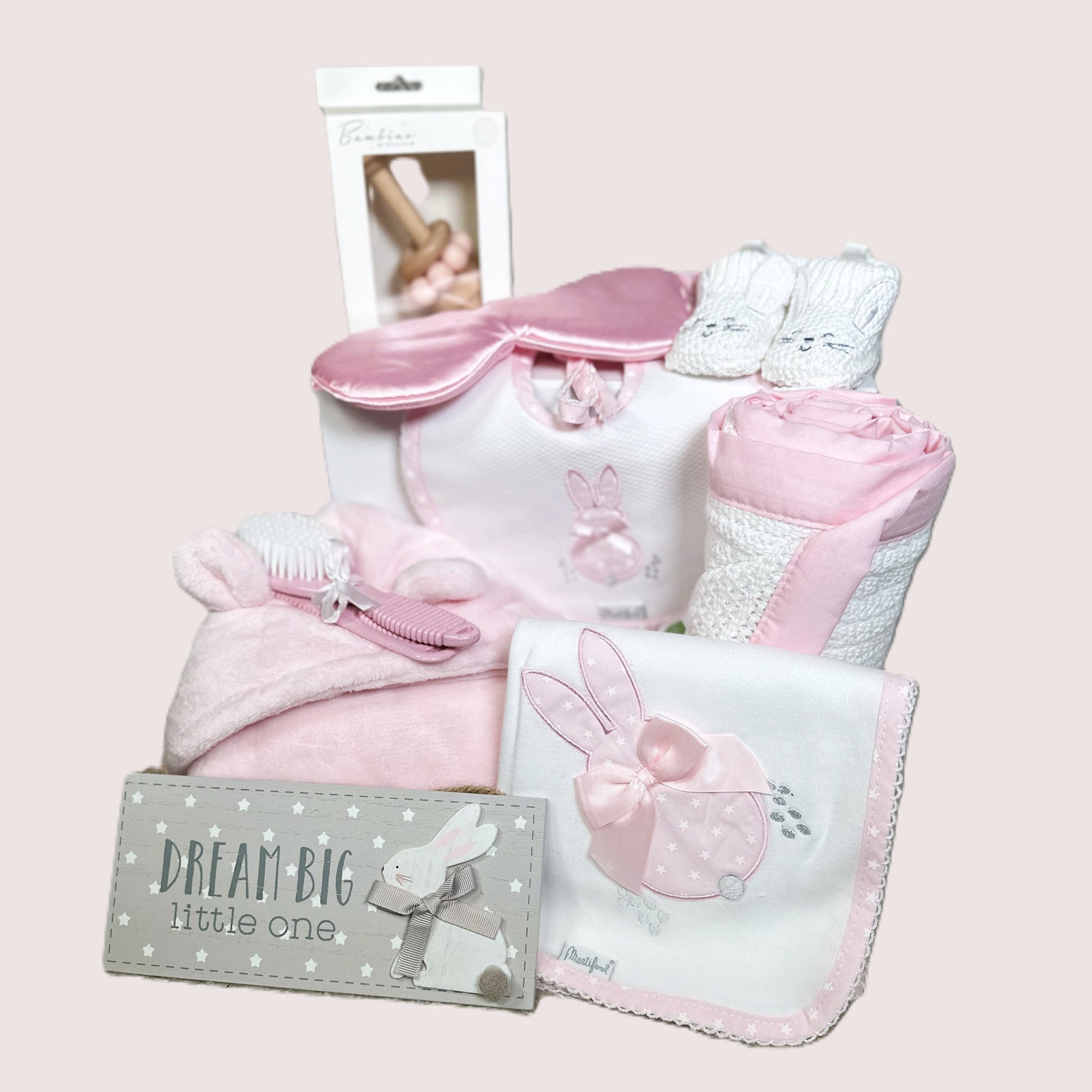baby girl hamper with pink and white baby items
