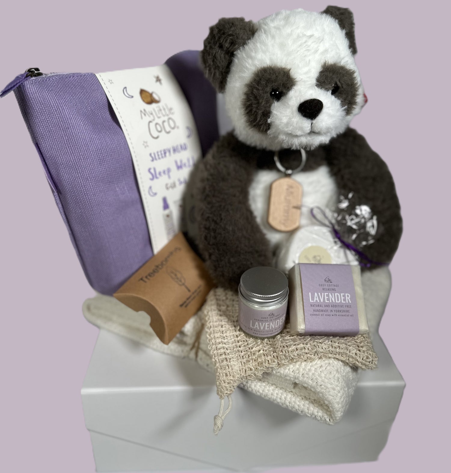 Panda baby hamper with panda soft baby toy, white cotton cellular baby blanket, new mummy natural toiletries and baby toiletries. New Mummy keyring.