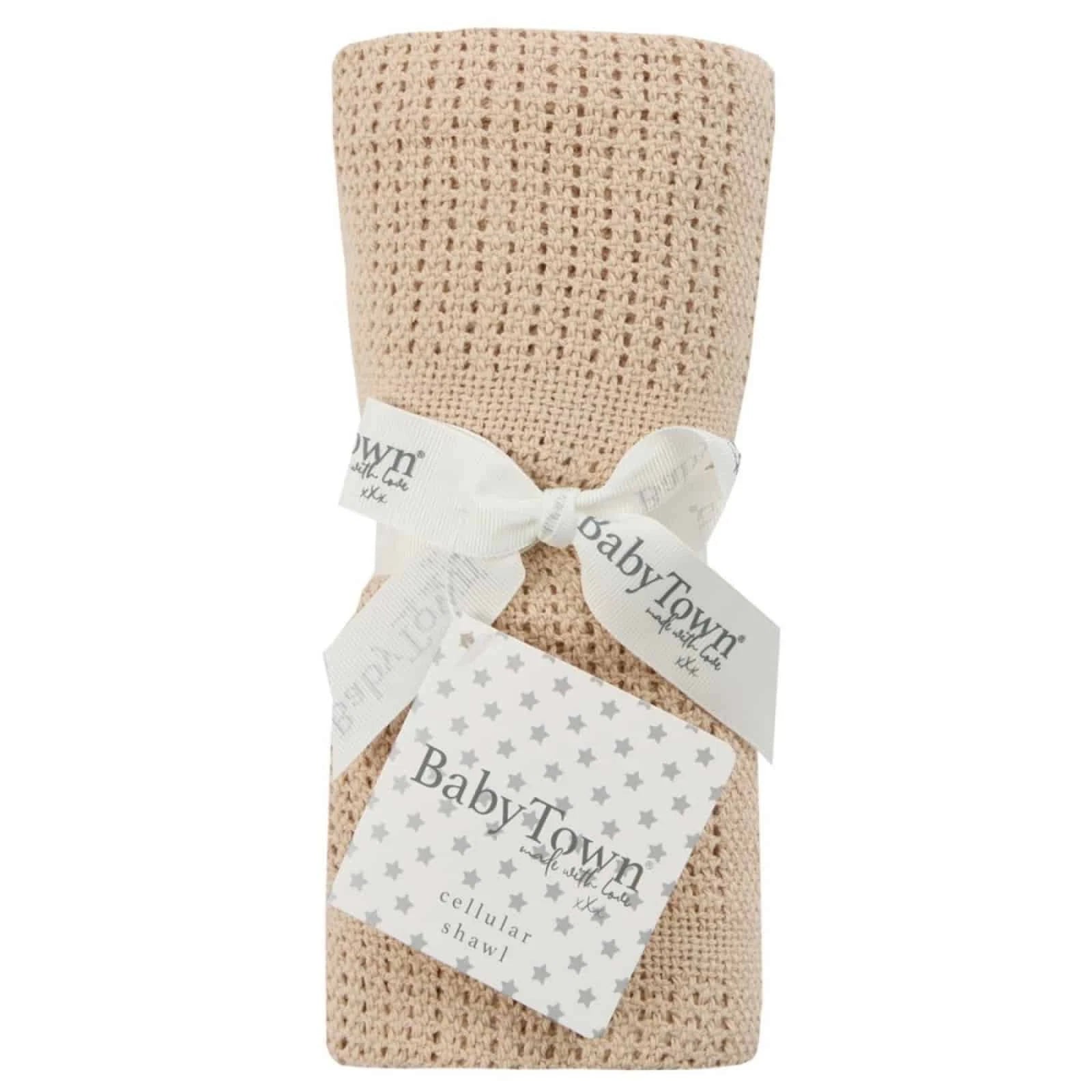 Beige cellular baby blanket with 'Baby Town' label on a white background