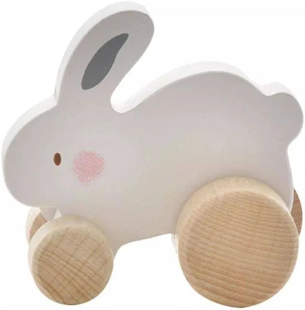 Bambino white rabbit-shaped toy with wooden wheels on a white background