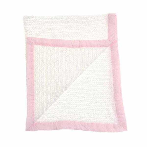 White cotton cellular baby blanket with a pink trim.