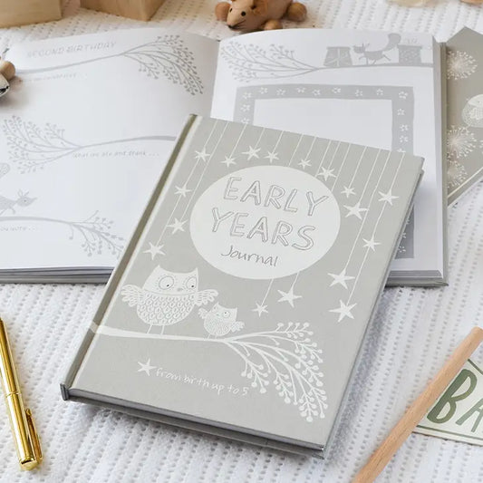 Beautiful grey and white early years journal and a notebook for jotting down important events