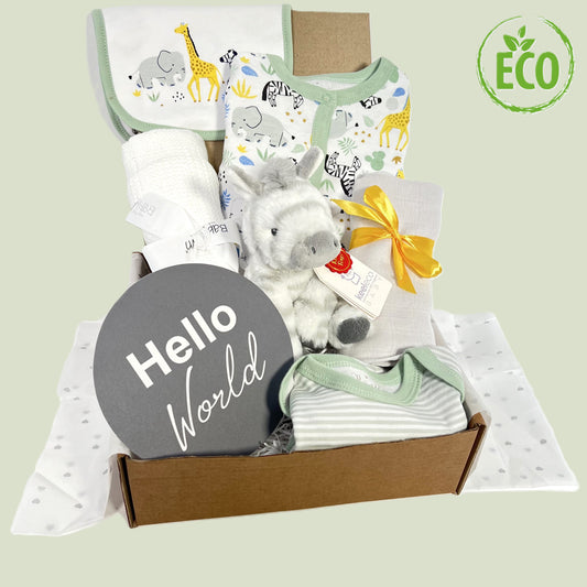 Safari Print cotton baby sleepsuit, baby bib and baby bodysuit all with mint green trim, A Keeleco zebra 14cm soft toy, a white cotton cellular baby blanket, a muslin square and alrge grey and white baby photography prop disc which reads "Hello world".