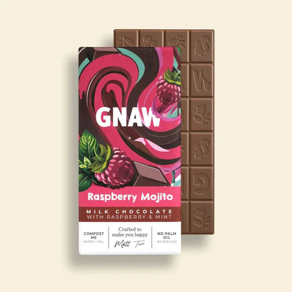 GNAW Raspberry Mojito milk chocolate bar with packaging on a beige background