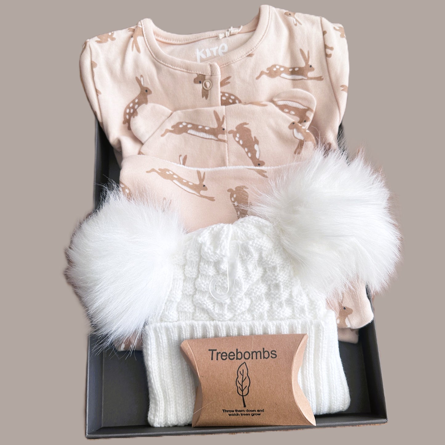 Baby hamper with organic cotton baby sleepsuit , hat and dribble bib with hare print.