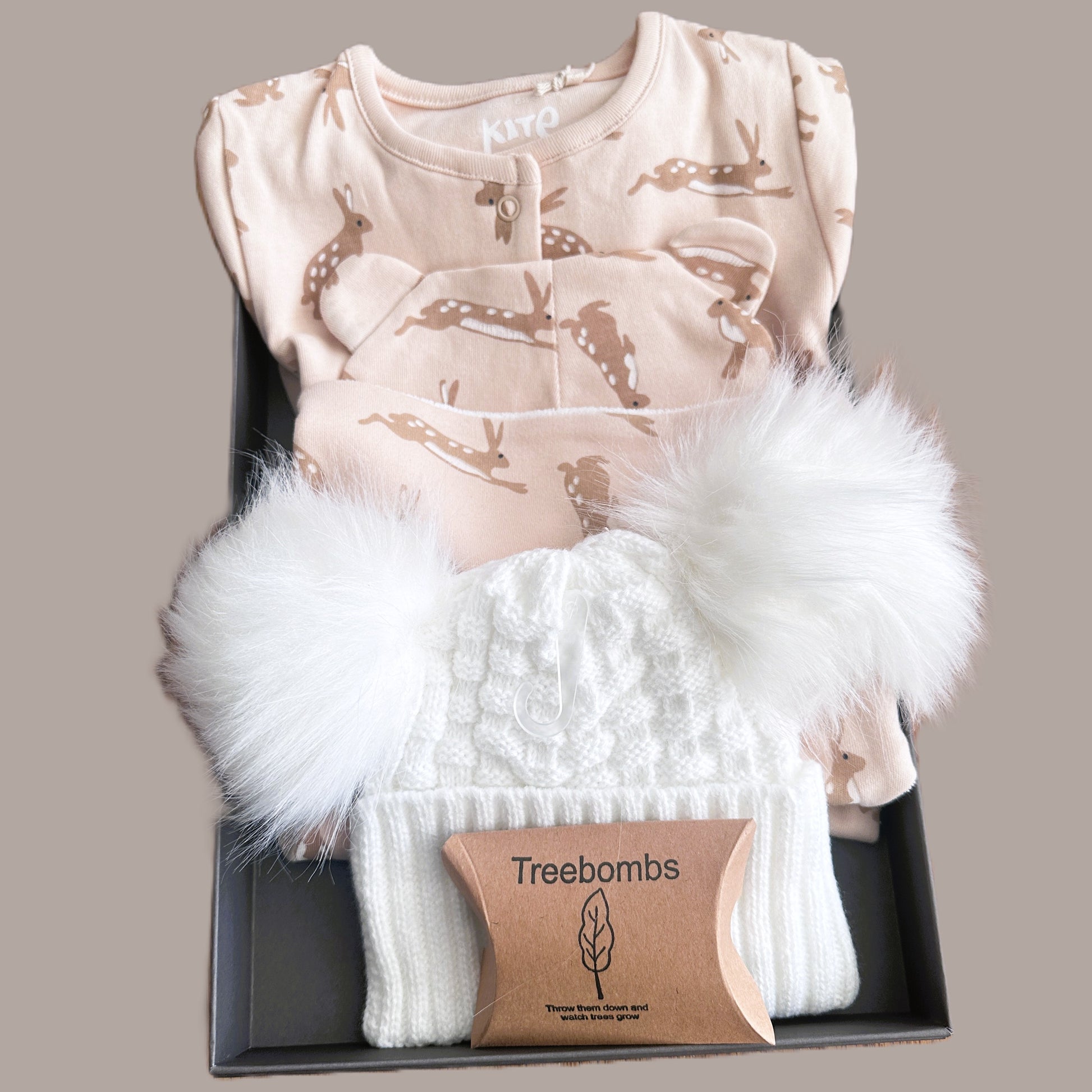 Baby hamper with organic cotton baby sleepsuit , hat and dribble bib with hare print.