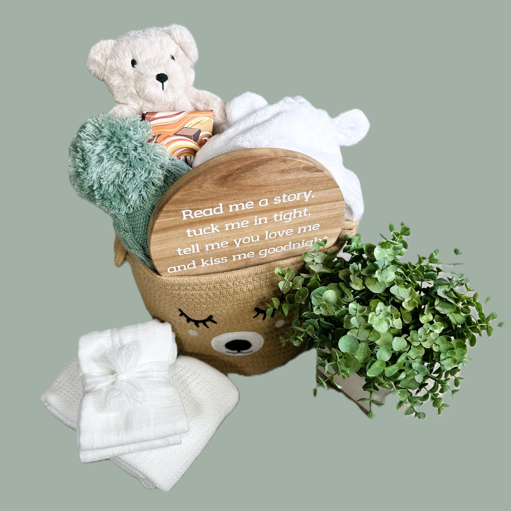 New baby gift basket, neutral colour palette, bear baby comforter , nursery sign baby dressing gown and chocolate