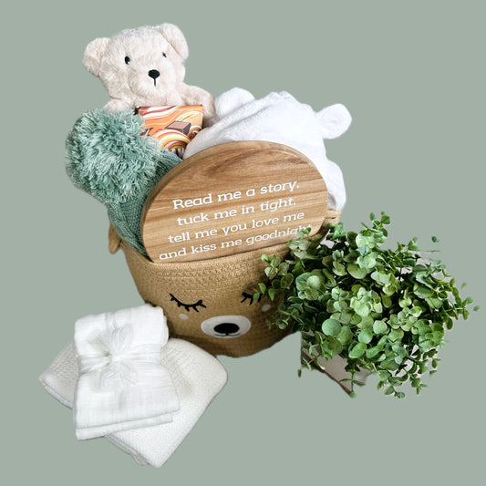 New baby gift basket, neutral colour palette, bear baby comforter , nursery sign baby dressing gown and chocolate
