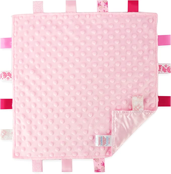 pink blanket with ribbon Taggies that sooth baby when they grasp it.