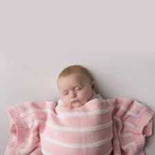 Pink and white striped cotton baby blanket.