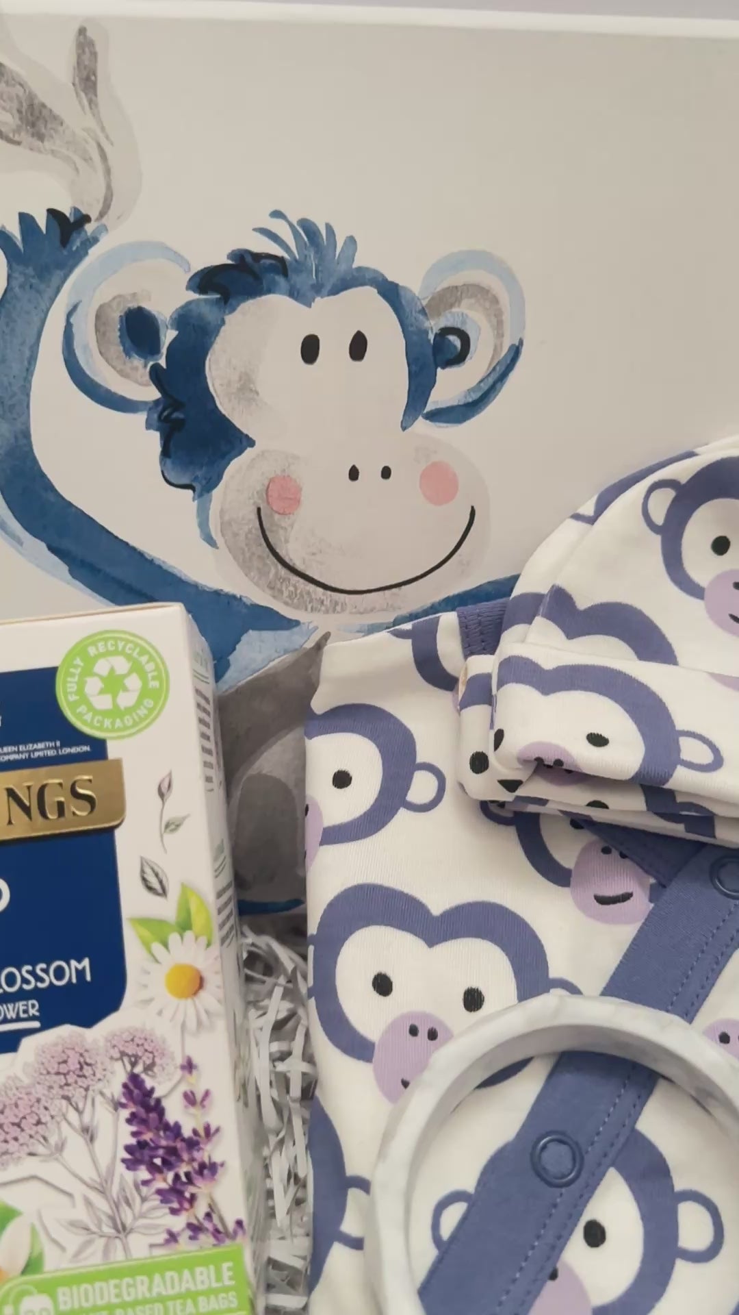 video of a monkey themed baby gift hamper box