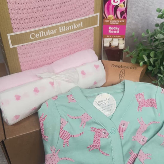 Baby girl hamper gift with pink blanket and sleepsuit with tiger print- video