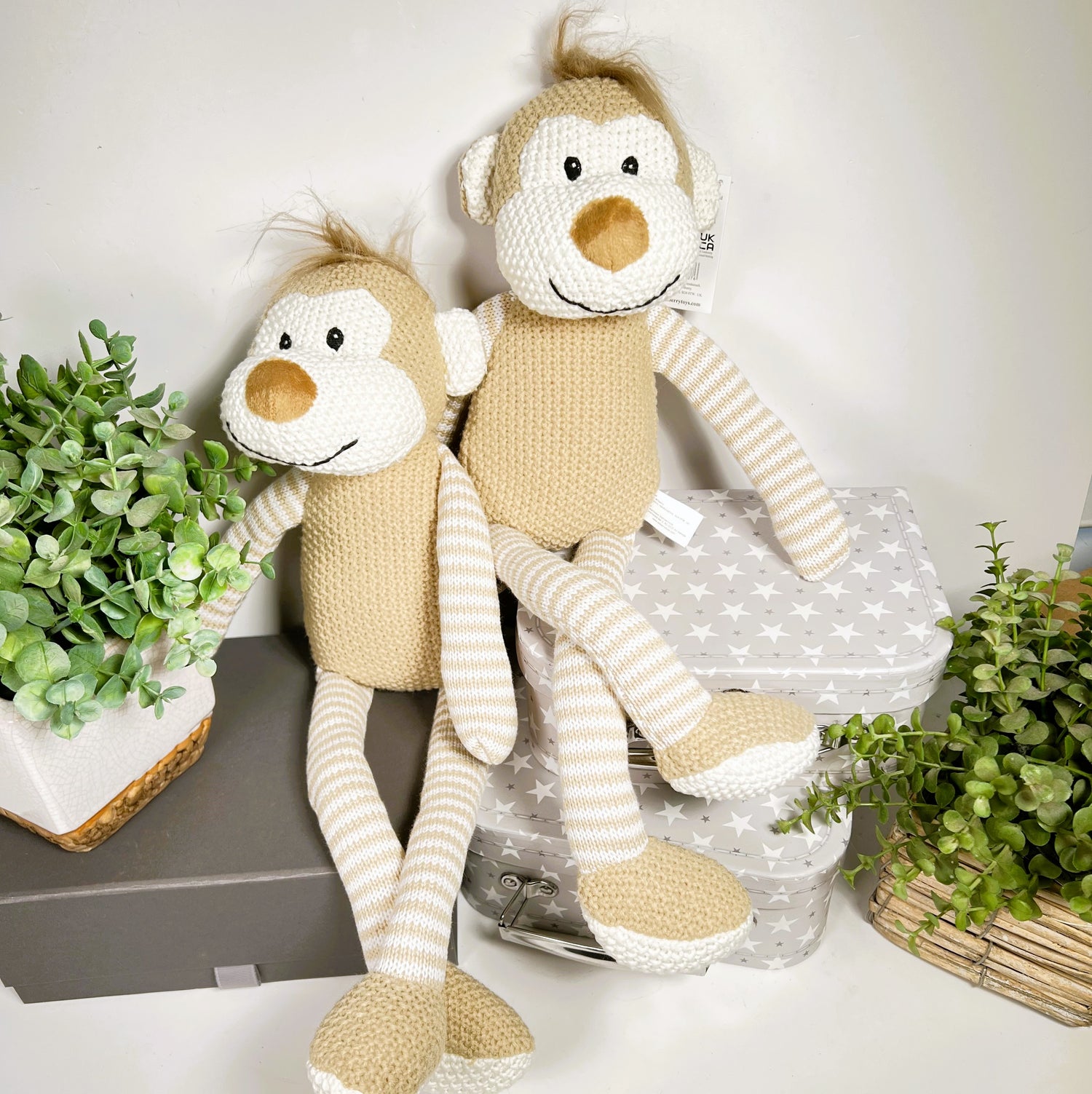 Wilberry knitted monkey bay soft toy.