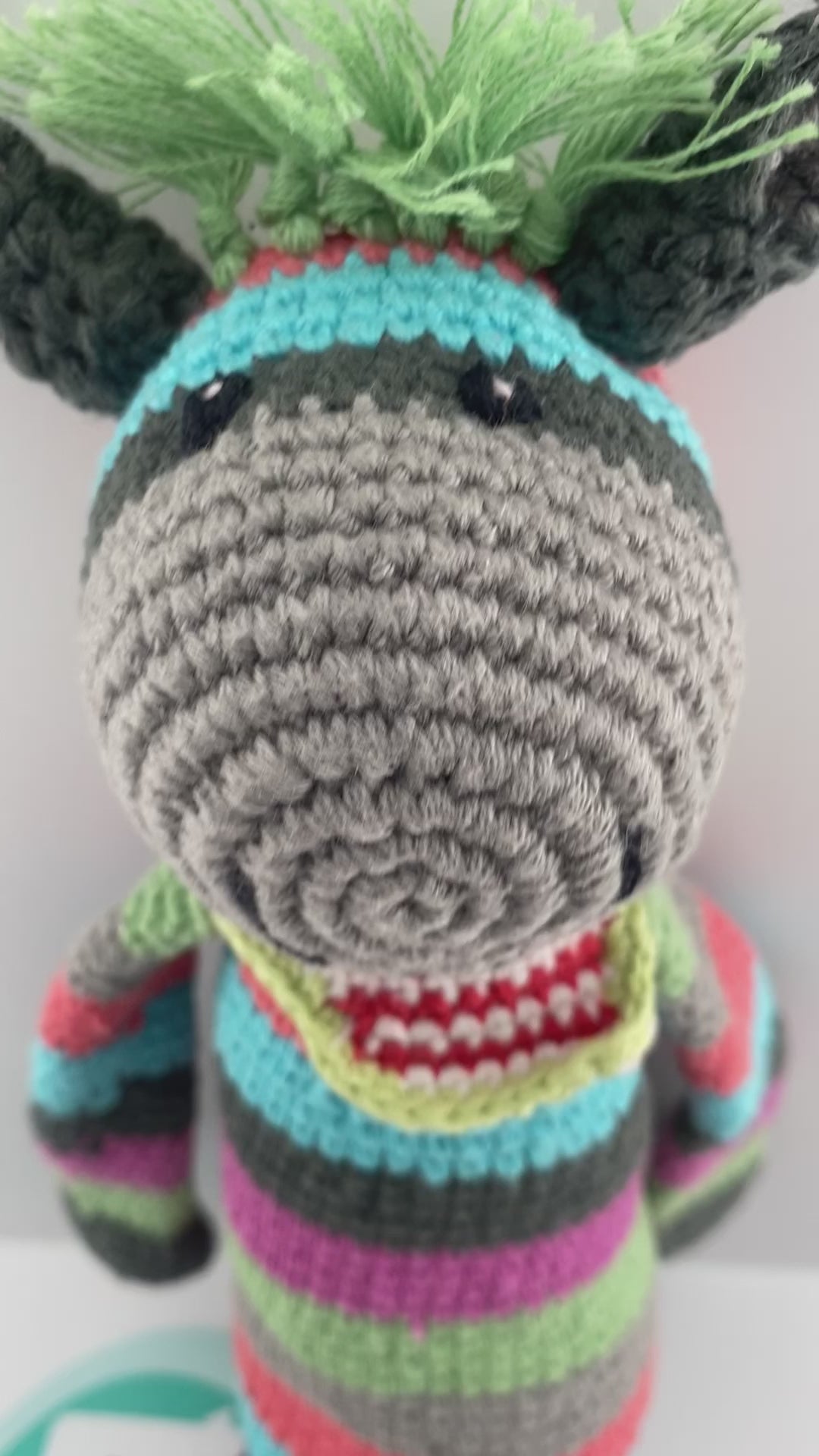Knitted donkey baby rattle video